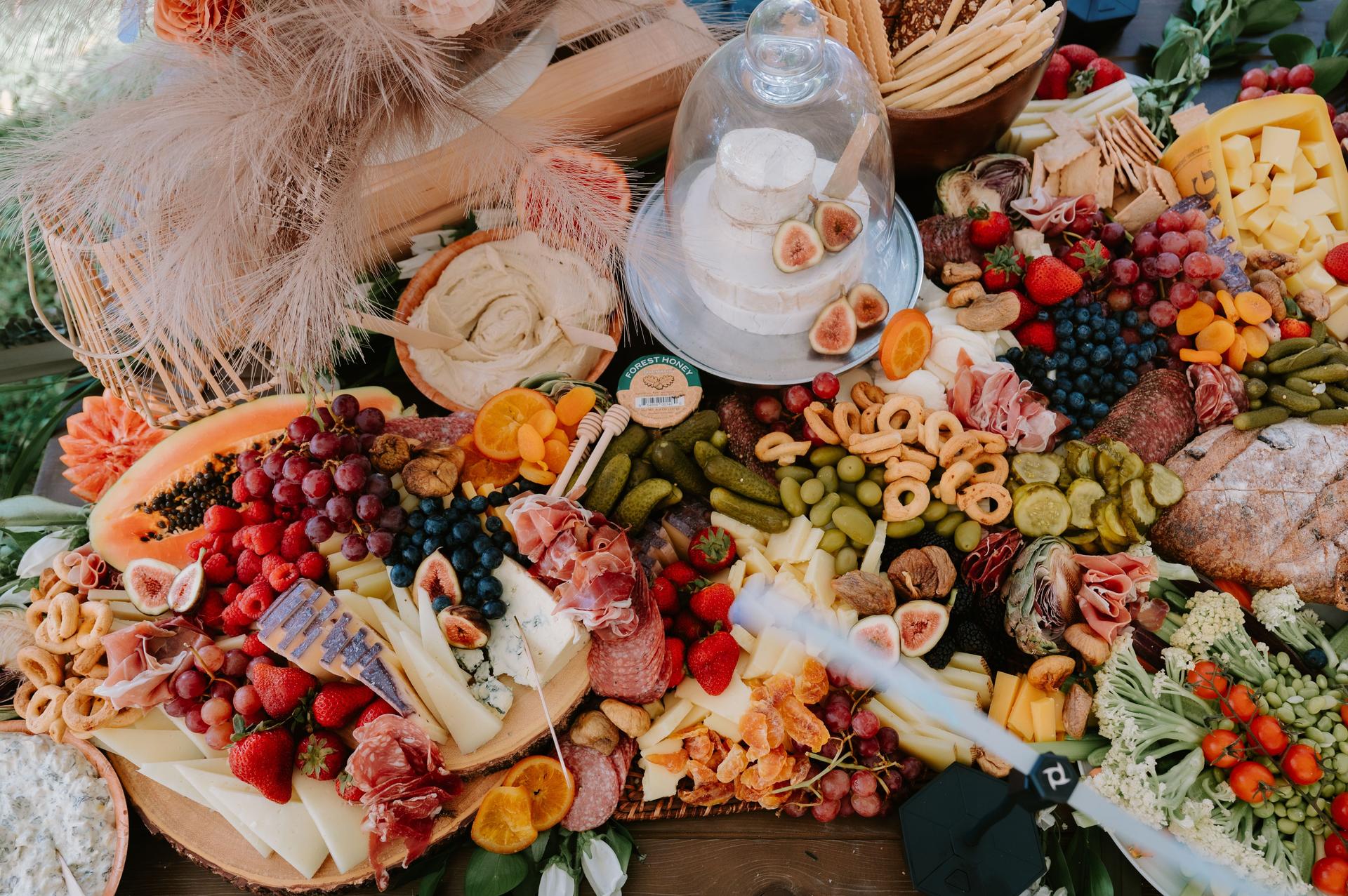 Large colorful summer charcuterie table