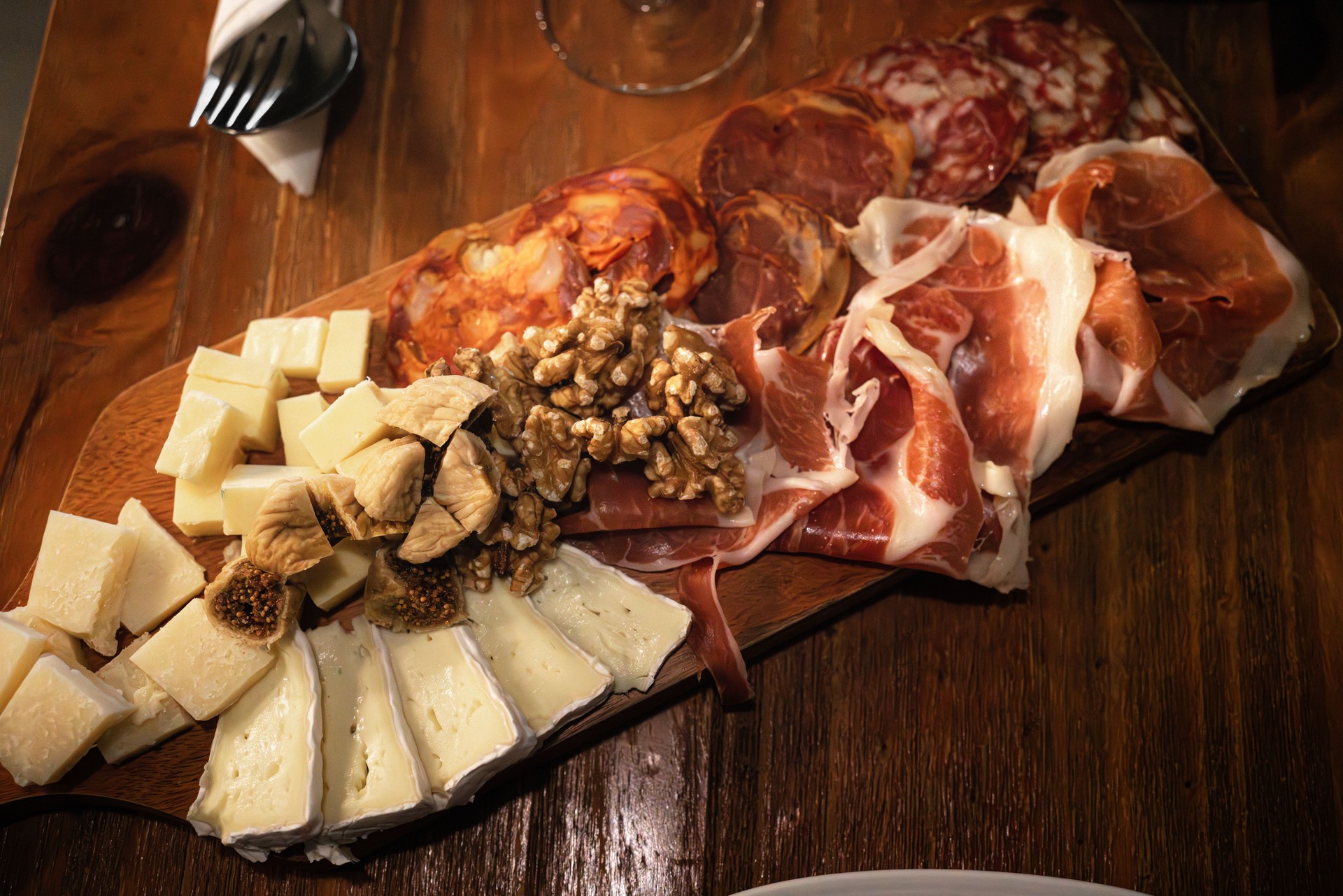 cheeses, ham, and sausages